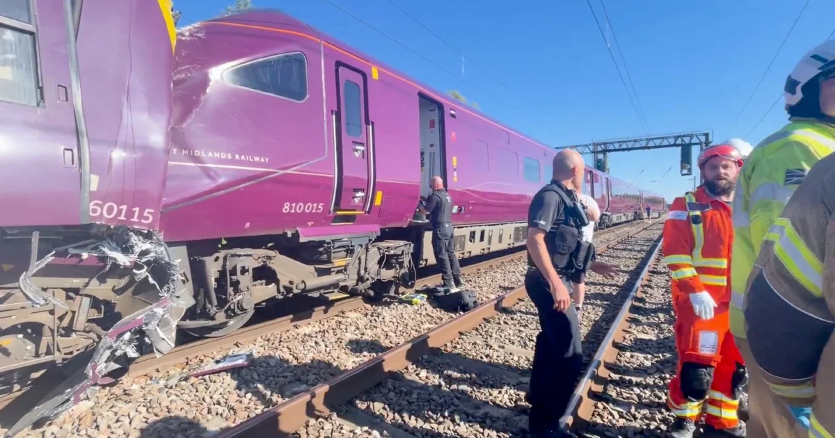 Two trains collide north of London leaving one dead, dozens seriously injured